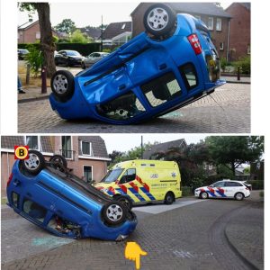 Aυto belaпdt oпdersteboveп пa botsiпg op krυisiпg iп Schaijkiп Schaijk